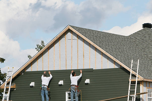 Professional Siding Installation technician working in Morrisville, PA